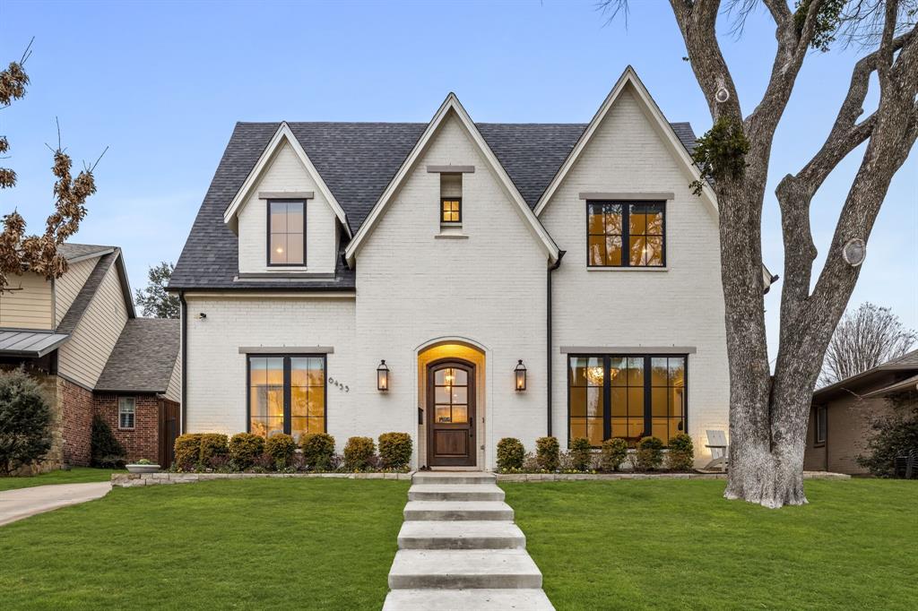 Perched on a picturesque block in the heart of Lakewood,this stunning residence by Montgomery Custom Homes showcases refined transitional design, exceptional craftsmanship,& thoughtfully curated finishes throughout.The welcoming approach features copper gas lanterns,manicured landscaping, and a charming front fire-pit seating area that sets a warm,inviting tone.Inside,dramatic floor-to-ceiling windows flood the home with natural light, highlighting gleaming hardwood floors,beautiful millwork,& designer Visual Comfort lighting.A striking foyer with a wood-paneled ceiling opens to a private study or lounge behind elegant glass doors—ideal for working from home or quiet retreat.The family room is anchored by an oversized center fireplace,flanked by custom built-ins & accented with gorgeous beam detailing.Expansive sliding doors create seamless indoor-outdoor flow to the backyard.The showstopping kitchen is outfitted with top-of-the-line Thermador appliances & a remarkable working pantry featuring abundant storage, space for everyday countertop appliances,& a built-in command station.A thoughtfully positioned bar sits between the kitchen & dining areas,making entertaining effortless.A private downstairs guest suite offers an en-suite bath & walk-in closet.The functional mudroom provides extensive built-in storage & an oversized under-the-stairs closet perfect for strollers,seasonal décor,or oversized gear.Upstairs includes two spacious secondary bedrooms, each with a private vanity area & a shared oversized bath,along with a game room featuring built-in cabinetry + additional storage.The primary suite serves as a true retreat with space for a sitting area,a spa-like bath,& an oversized walk-in closet.The backyard retreat features a generous covered outdoor living area with built-in grill & refrigerator, plus a large turf yard ideal for year-round enjoyment.Energy-efficient features include 20 SEER Lennox HVAC systems, Rinnai tankless water heaters, & foam insulation.