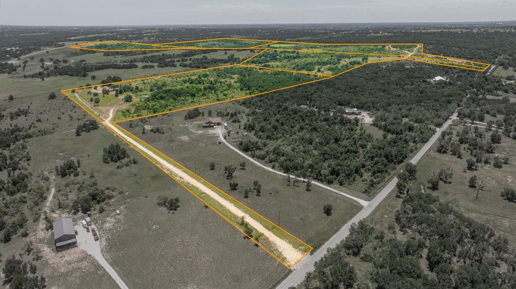 If you're looking for acreage that's close to town but provides plenty of privacy, YOU FOUND IT! This property sits just 5-6 miles north Stephenville, Tx and is exactly what everyone has been searching for. Gorgeous mix of trees, great sandy soil, a convenient location to town, and plenty of room to spread out and enjoy the country.

This tract is 44.817 acres and has it all! You'll find a beautiful blend of trees and native pasture, perfect for livestock, recreation, or building your dream home. There are TWO tanks and a wet weather creek running through the property, so you'll have plenty of water and a great spot to fish or watch the deer and turkey come in. The whole place is newly fenced and ready to go, plus it will have a water well and electric meter installed, making it build-ready from day one!

You just can't beat the combination of privacy, sand loam soil, and convenience that this property has to offer. There is truly nothing else like this on the market! If you're looking for acreage in this area, you better act quick because a property like this won't last long!