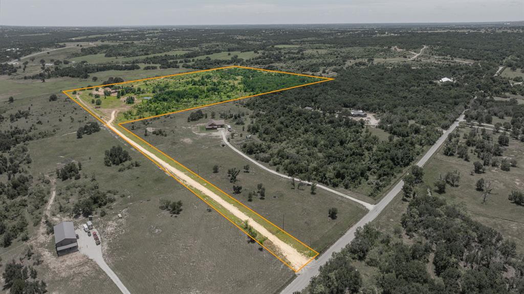 If you're looking for acreage that's close to town but provides plenty of privacy, YOU FOUND IT! This property sits just 5-6 miles north Stephenville, Tx and is exactly what everyone has been searching for. Gorgeous mix of trees, great sandy soil, a convenient location to town, and plenty of room to spread out and enjoy the country.

This tract is 44.817 acres and has it all! You'll find a beautiful blend of trees and native pasture, perfect for livestock, recreation, or building your dream home. There are TWO tanks and a wet weather creek running through the property, so you'll have plenty of water and a great spot to fish or watch the deer and turkey come in. The whole place is newly fenced and ready to go, plus it will have a water well and electric meter installed, making it build-ready from day one!

You just can't beat the combination of privacy, sand loam soil, and convenience that this property has to offer. There is truly nothing else like this on the market! If you're looking for acreage in this area, you better act quick because a property like this won't last long!