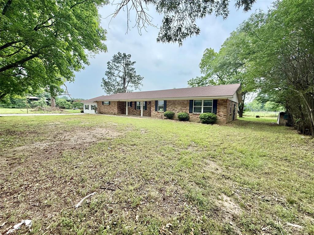 Just Reduced! Priced to sell and ready for its next owner. Seller is motivated and open to working with buyers, including potential floor plan changes with an acceptable offer. Come check out this expansive 8-bedroom, 3-bathroom home situated on 2 acres just minutes from town, offering the perfect blend of space, privacy, and convenience. Ideal for large families, multi-generational living, or those seeking an investment opportunity, this property features a flexible floor plan with generous living areas & plenty of room to make it your own. Whether you're looking to renovate, update, or move right in, the possibilities here are endless. The acreage offers room to expand, add a shop, garden, or even create your dream outdoor entertaining space. Enjoy the peace of country style living with quick access to schools, shopping, dining, and commuter routes.