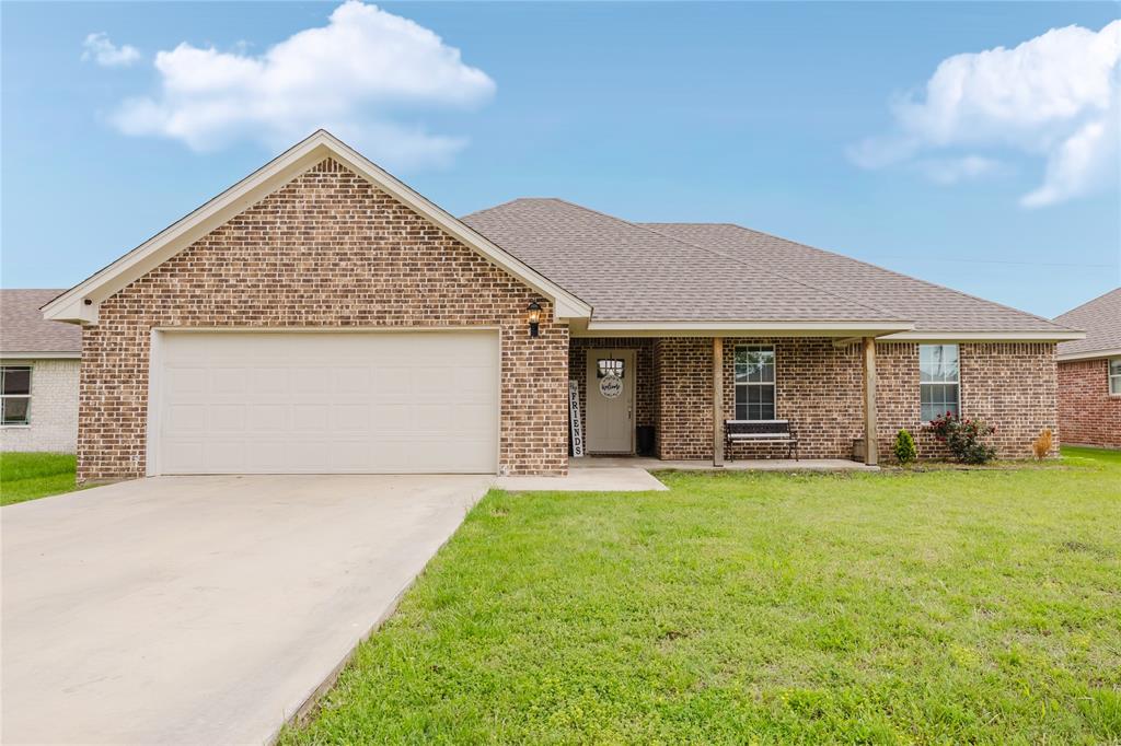Welcome to 417 Colony Street in Eastland, Texas. A beautiful, newer construction home, in one of Eastland’s premier neighborhoods. Built in 2022, this 4 bedroom, 2 bathroom home offers 1,481 square feet of comfortable, move-in ready living with the modern features buyers are looking for. The open floor plan connects the kitchen, dining, and living areas, creating a space that feels welcoming for everyday life and entertaining alike. You’ll love the granite countertops, large kitchen peninsula, electric fireplace, and thoughtful finishes throughout. The private primary suite offers dual sinks, a soaking tub, separate shower, as well as his and her walk-in closets. Outside, the covered back patio with an outdoor fireplace extends your living space and overlooks a spacious fenced backyard with room for kids, pets, and gatherings. If you’ve been searching for a family-friendly home in Eastland with modern construction, great outdoor living, and a desirable neighborhood setting, this one checks all the boxes.