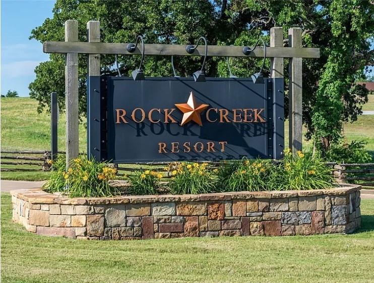 This lot is a premier larger cul-de-sac lot located in the Beautiful Rock Creek Resort offering a prime opportunity to enjoy an array of exclusive amenities. Security Gated Community. Easy access to lake.
The New Owners will have access through the Club Membership to a Nicklaus Design Premier Golf Course, Restaurant, Pro-Shop, Swimming Pool, Fitness Center and Outdoor Sports Court. The full-service Marina with a Ship Store is close to this lot and offers Lake enthusiasts and Bass fish anglers plenty of opportunity to enjoy the waters on Lake Texoma. Surveyor Stack with Orange Flagging Tape and located at the front of the Lot. The Buyer will be required to purchase their own survey and conduct their own due diligence to verify easements and exact lot size. 
Appointments must be scheduled for showing.