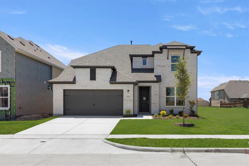 MLS# 21311861 - Built by RockWell Homes - Sep 2026 completion! ~ New two-story home Republic plan, designed to blend style with functional living spaces. This thoughtfully crafted home offers a flexible layout with 4 bedrooms and 3.5 bathrooms, home office, providing ample room for growing families or those who enjoy extra space. The home also includes a 2-car garage, a striking full brick exterior, a covered patio, and dual-pane energy-efficient windows for optimal comfort and savings. The open-concept design places the living, kitchen, and dining areas at the back of the home for added privacy and flow with soaring ceilings. The kitchen is a chef’s dream, featuring island with bar stool seating, luxury solid surface countertops, stainless appliances, a gas cooktop, built in oven, dishwasher, microwave, and ceramic backsplash. The sink with a Delta faucet and 42-inch cabinets provide both functionality and style, while the walk-in pantry offers plenty of storage space. The living area is brightened by multiple dual-pane windows and soaring ceilings, creating a welcoming atmosphere. The primary suite, conveniently located on the first floor, provides a private retreat with a garden tub, a ceramic tile shower with a glass enclosure, a dual sink vanity with solid surface countertops, towel bars, private water closet and a spacious walk-in closet. Premium Delta faucets add a touch of luxury to the space. Upstairs, the secondary bedrooms each come with walk-in closets and are grouped around a central game room, providing additional living area space. The secondary bathroom features ceramic tile flooring, ceramic tile tub-shower surround, upscale cabinets, luxury countertops, Delta faucets, towel bars and lighting package. Additional features of this new home include a fully automated sprinkler system, full landscaping package, gutters, a garage door opener, fully fenced in private back yard with gate, smart home, tankless hot water heater and energy efficient HVAC.