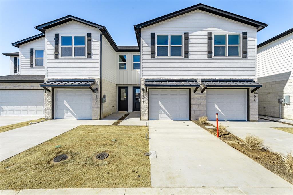Introducing Tarleton Crossings
Discover Tarleton Crossings beautiful luxury townhomes located a short distance to Tarleton  State University, restaurants and entertainment. Tarleton Crossings offer a maintenance free lifestyle with fully sodded yards shrubbery and sprinkler system all maintained by the HOA. These beautiful townhomes are boasting with 9 ft. ceilings on the first and second floor, beautiful shaker style soft close cabinets with stone counter tops on the first floor with undermounted sink, stainless steel appliances and built in microwave. Decorative light fixtures and canned lighting according to residence plan. Step outside to your own peaceful sitting area on a 10 x 10 concrete patio with decorative fencing 15 feet from the back of the residence.  Tarleton Crossings are great for families, students, long and short term rentals.

PROMO-At the current non-negotiable Sales Price, Seller agrees to pay all closing costs, excluding any fees charged by Buyer’s lender. In the event the existing plat is not acceptable to Buyer’s lender, Seller shall be responsible for the cost of a new survey.