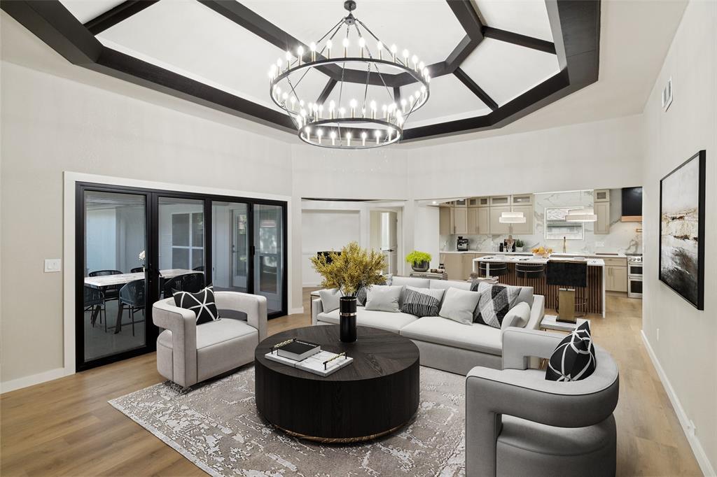 Completely reimagined with a focus on luxury, light, and indoor-outdoor living, this stunning North Dallas residence offers 4 bedrooms, 3 full baths, and a private executive office. The dramatic open-concept design is anchored by a show-stopping waterfall-edge quartz island and an impressive 140-inch folding glass wall that seamlessly blends indoor and outdoor living. The private primary retreat features a fireplace and a spa-inspired bath with a freestanding soaking tub, dual ceiling-mounted rainfall showers, and designer tile finishes. A dedicated executive office with chandelier lighting provides the perfect work-from-home space. Extensive upgrades include new HVAC, new plumbing, new energy-efficient windows, luxury flooring throughout, and a designer-curated kitchen featuring custom cabinetry, glass display cabinets, pot filler, and premium finishes. From the grand entrance and luxury front door to the beautifully reimagined living spaces, this turnkey residence offers a level of style and functionality rarely found in the area. Homes of this caliber rarely become available in such an established North Dallas location. Schedule your private tour today!