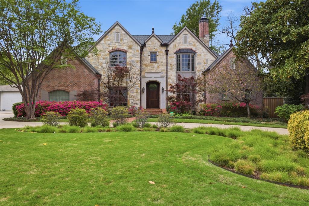 Nestled on an expansive, over half-acre lot in the heart of Preston Hollow, this one-of-a-kind estate seamlessly blends timeless elegance with modern comfort—designed for both grand entertaining and effortless everyday living.
A dramatic, light-filled foyer welcomes you with soaring ceilings and sets the tone for the home’s refined interiors. Gracious formal living and dining spaces flow beautifully alongside a private study, offering both sophistication and versatility.
At the heart of the home, the chef’s kitchen is thoughtfully designed with premium stainless steel appliances, quartz countertops, double ovens, and a generous walk-in pantry—opening seamlessly to the main living areas for a connected and inviting atmosphere.
The serene primary suite, located on the main level, is a true retreat—bathed in natural light and offering tranquil views of the resort-style backyard. Upstairs, a spacious game room anchors five additional bedrooms, providing ample space for family and guests.
Step outside to your private outdoor oasis, where a covered patio overlooks a sparkling pool and spa and a large artificial turfed yard—perfect for year-round entertaining or relaxing in complete privacy.
A rare opportunity to own a distinctive property in one of Dallas’ most coveted neighborhoods.