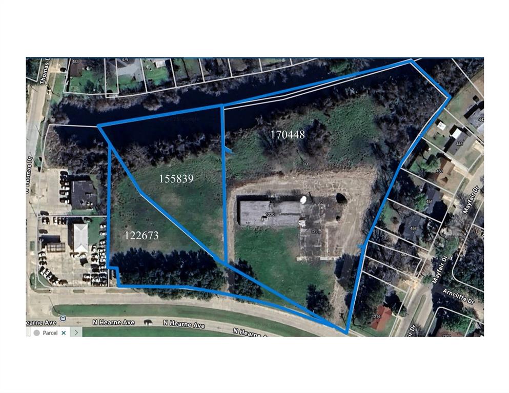 This property is actually in Bossier Parish.  Yes, that's correct.  It is in the Shreveport City Limits and Bossier Parish.  Please make sure you put all 3 parcel numbers, 155839, 122673  and 170448 when bringing the offer.  There was a building there but it has been removed. You have utilities right there on location so this will be easy for you.  This is on the service road of N Hearne for easy access, also.  This is a great potential property for your next commercial venture.  Flat land that is in an X Flood Zone per the maps.