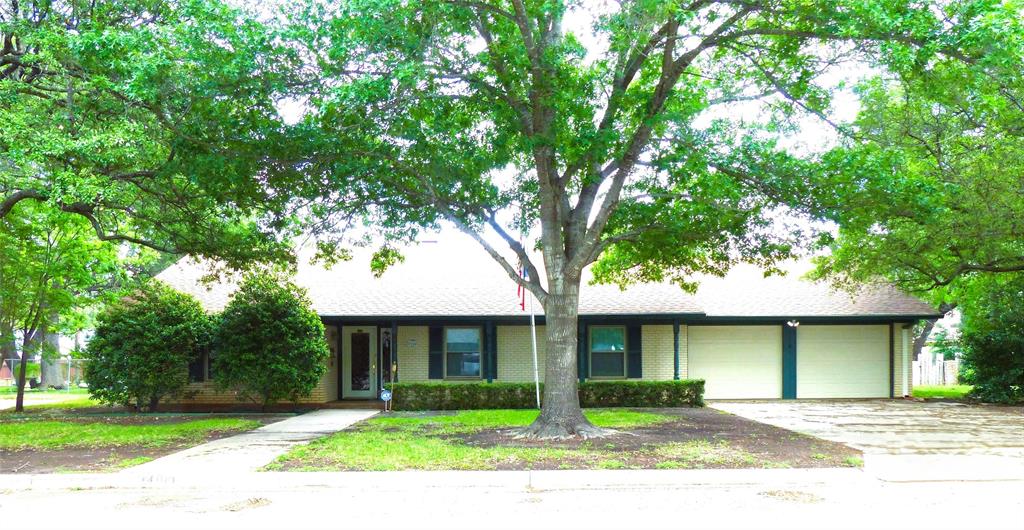 Location, location, location.  Nice three bed two bath brick home in a very nice neighborhood.  This home features 2,064 sq ft of living space under central heat and air.  The kitchen has a built in microwave, dishwasher, and electric stove top.  It also features an island with bar and a pass through to the living area.  Two living areas are great for entertaining as well as a bonus room for games and viewing the back yard.  Nice spacious bedrooms with two walk in closets. The home is equipped with triple pane windows, water conditioner, and plenty of storage. Enjoy the spacious backyard with fruit and pecan trees.  The workshop in back is waiting to be used.