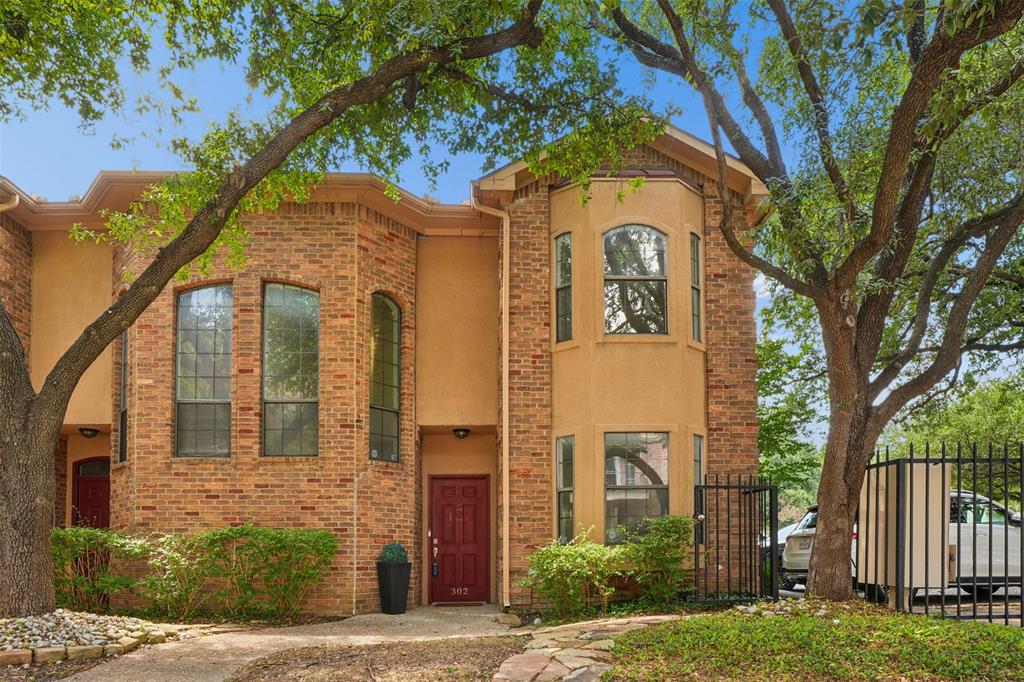 Charming and thoughtfully updated condo in the highly desirable SOHIP neighborhood. Open living area features a gas fireplace with stunning Ann Sacks tile surround. The light and crisp kitchen boasts quartz countertops, stainless steel appliances, and a premium Liebherr refrigerator. New engineered hardwood floors flow throughout the staircase and entire second level, adding warmth and continuity to the home.  Step outside to your private patio complete with low-maintenance synthetic grass, perfect for relaxing or entertaining. Upstairs HVAC condenser replaced in 2025, new engineered hardwoods, new stove, microwave and dishwasher, updated electrical panel and devices, fresh paint throughout and stackable washer & dryer to convey with the home as well. Situated in a very walkable neighborhood surrounded by mature trees and minutes to Lower Greenville, KnoxHenderson, and Downtown Dallas dining and entertainment. Schedule your showing today!