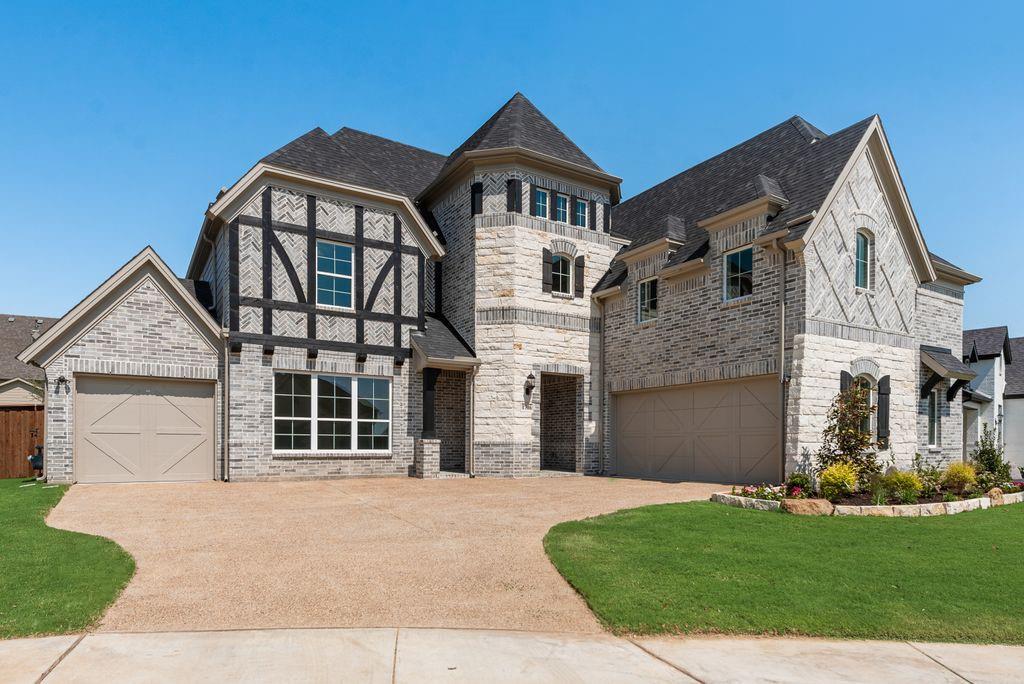 Stunning New Grand Home in South Pointe. This beautifully designed Grand Home is JUST COMPLETED, Mansfield’s premier master-planned community. Perfectly positioned on a spacious 0.23-acre lot with a 3-car garage, this home blends elegance, comfort, and thoughtful design in one of the area’s most desirable neighborhoods. Enjoy resort-style amenities including a pool, parks, greenbelts, scenic trails, and a state-of-the-art amenity center—all within top-rated Mansfield ISD.
Step inside to an open-concept layout that’s ideal for everyday living and entertaining. A soaring, vaulted family room connects to a large, covered patio featuring an outdoor fireplace, a gas line for grilling, and pre-wired speakers—perfect for gatherings. The double staircase with wrought iron balusters adds architectural charm, while 8' interior doors and stylish lever hardware elevate the interior.
The gourmet kitchen features Shaker cabinetry, Omegastone countertops, a 5-burner gas cooktop with custom vent hood, pot filler, double ovens, stainless steel appliances, and a full-bowl sink. Smart storage solutions include pots and pans drawers and a hidden trash pull-out. A formal living area offers flexibility as a home office or den, and a guest suite on the main level ensures privacy and convenience.
The primary suite is a private retreat with a freestanding tub, dual vanities, and a tiled glass shower. While upstairs, a spacious game room and a media room or children’s retreat, pre-wired for surround sound, offer additional space to relax and unwind.
Walk to area schools, with a new on-site campus planned soon. Built by an Energy Star Partner with R38 insulation, this home includes full builder warranties for peace of mind.