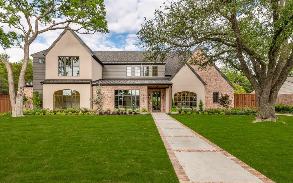Situated on a beautifully landscaped lot, this brand new, exceptionally built custom residence by Montgomery Custom Homes offers a refined blend of timeless design, elevated craftsmanship, and modern livability. The home features 5 bedrooms, including a luxurious primary suite and private guest suite on the first floor.
Designed for both everyday living and entertaining, the home includes a formal dining room, a private study downstairs, and a custom upholstered breakfast nook. The open-concept kitchen is outfitted with Thermador appliances, Mont Blanc quartzite countertops, a Venetian plaster vent hood, and a built-in bar with beverage drawers and an ice maker.
Upstairs, a spacious game room is complemented by an additional sitting area ideal for a secondary lounge, TV room, or study space.
Built with a focus on quality and efficiency, the home features full open-cell foam encapsulation, Level 4 smooth sheetrock, Lincoln windows, and three zoned Carrier HVAC systems. Two Navien tankless water heaters with recirculation provide added comfort.
Living spaces are anchored by two masonry fireplaces, including a carved limestone surround, while thoughtful conveniences such as three washer dryer areas (including one in the primary closet), landscape lighting, and holiday lighting outlets enhance everyday living.
Outdoor living is equally impressive, featuring a resort-style pool and spa, fully turfed backyard with irrigation, and a covered patio with screens, tile flooring, and a fully equipped outdoor kitchen with grill, vent hood, and refrigerator.
The gated driveway leads to a two-car attached garage and a detached, climate-controlled single-car garage with a dedicated pool bath—offering flexibility for additional storage, fitness, or hobby space.
A rare opportunity to own a truly custom, thoughtfully designed home in a highly desirable Dallas location.