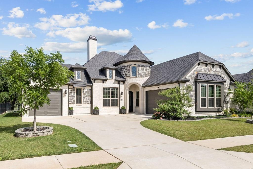 Welcome to an extraordinary luxury retreat nestled inside the prestigious Southern Oaks Golf & Tennis Club community in Burleson. Perfectly positioned on the 10th hole with breathtaking golf course views, this custom-designed masterpiece blends timeless elegance, sophisticated craftsmanship, and resort-style living into one unforgettable property. Offering 3 spacious bedrooms, 2.5 designer bathrooms, and a private executive office, every inch of this residence was thoughtfully curated with upscale finishes and architectural detail. The open-concept design flows effortlessly between the grand living spaces and the chef-inspired custom kitchen, featuring premium cabinetry, high-end appliances, imported Turkish designer lighting fixtures, and a stunning marble chiseled-edge sink that creates a true statement piece at the heart of the home.
Natural light pours through the expansive windows, highlighting the luxurious textures, custom millwork, and refined modern touches throughout. The split-bedroom layout offers privacy and comfort, while the oversized 3-car garage provides both convenience and functionality.
Step outside into your own private resort-style paradise. The professionally designed backyard showcases a sparkling pool and spa combo with elegant water features, an outdoor grilling station, covered patio, and panoramic golf course views that create the perfect atmosphere for entertaining or relaxing in total serenity. The expansive outdoor living area offers endless possibilities, whether envisioning a luxury pergola, glass-enclosed sunroom, outdoor lounge, or custom entertainment pavilion, this space was designed to inspire imagination and elevate lifestyle.
Located within the sought-after Thomas Crossing community, residents enjoy premier amenities including a championship golf course, clubhouse, pickleball courts, tennis courts, walking trails, sidewalks, and an active luxury lifestyle atmosphere, all while being served by top-rated Burleson ISD schools.