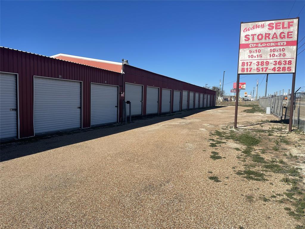 Located just southwest of DFW, Godley Self Storage offers 155 storage units in a range of sizes across approximately 2.41 acres. The property features nine main buildings secured behind a gated entrance, along with an additional large storage building on the adjoining parcel. The site also includes extra land suitable for adding more units, creating strong potential for expansion and increased revenue. Its location in a growing corridor enhances demand stability and supports future rent growth. Listing agent is related to seller.
