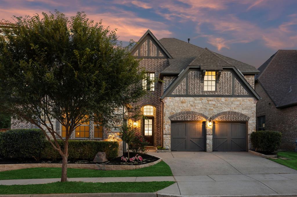 Welcome to this stunning, fully remodeled 4-bedroom, 3.5-bathroom home in the highly sought-after, community of Lakeside on the shores of Grapevine Lake. Sitting on an oversized corner lot, just steps from upscale shopping, exceptional dining, and scenic trails, this home offers the perfect blend of luxury, convenience, and lifestyle. Enjoy a 5 minute walk to the lake and breathtaking waterfront views right in your neighborhood. From the moment you arrive, the home’s inviting curb appeal shines with fresh landscaping and a beautifully updated exterior. Inside, an elegant entryway and gorgeous hardwood floors lead into bright, open-concept living spaces designed for both everyday functionality. The first floor features a private office, laundry room with sink, open living and dining areas, and a chef-inspired kitchen. The kitchen showcases stunning Taj Mahal quartzite countertops and backsplash, large island, 6-burner gas cooktop, ample cabinetry, and brand-new appliances. The spacious living room impresses with soaring ceilings, stone fireplace, and expansive windows that fill the home with natural light. The luxurious primary suite offers a retreat with a bay window sitting area, soaking tub, dual vanities, a beautifully updated walk-in shower, and a custom walk-in closet. A secondary bedroom with its own en-suite and an additional half bath complete the main level. Upstairs, the entertainment space features a media room and game room connected by a wet bar—perfect for hosting family and friends. Two additional bedrooms share a Jack-and-Jill bath, along with a half bath. Additional updates include new carpet, all-new lighting & hardware, fresh interior & exterior paint, and 3-car garage with epoxy floors. Minutes from Grapevine Lake, outdoor recreation awaits—from boating and hiking to enjoying the area’s scenic beauty. With premier shopping, dining, & entertainment all within walking distance, this exceptional home truly offers the best of Lakeside living.