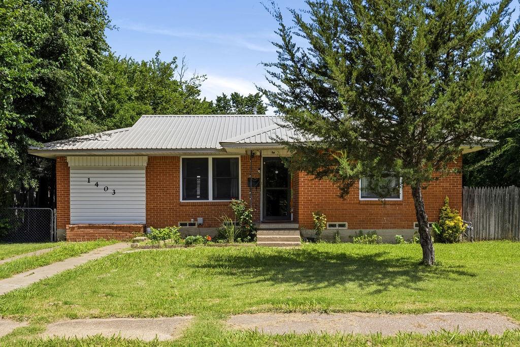 No HOA! Charming and well-maintained 2-bedroom, 1-bath home in a prime Irving location! Situated on a spacious quarter-acre lot shaded by mature trees, this property offers plenty of room to enjoy outdoor living, gardening, play, or future possibilities. Inside, you'll find an oversized living room that provides a comfortable and inviting space for relaxing or entertaining. Durable wood-look flooring flows throughout the home, creating a warm and cohesive feel with easy maintenance. The functional floor plan maximizes living space while offering comfortable bedrooms and abundant natural light. A detached 2-car garage provides additional parking, storage, or workshop potential. The expansive backyard is a standout feature, offering endless opportunities for outdoor enjoyment. Conveniently located near shopping, dining, parks, schools, and major highways, this home combines classic charm, a generous lot size, and an unbeatable Irving location. Whether you're a first-time homebuyer, investor, or someone looking to downsize without sacrificing outdoor space, this property is full of potential and ready to make your own. Don't miss this opportunity to own a home on a large, tree-filled lot in the heart of Irving!