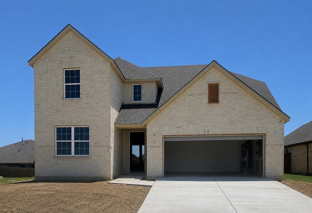 MLS# 21327869 - Built by Taft Homes - Ready Now! ~ Spacious 5 - bed, 4 - bath contemporary two - story home on corner lot in Summer Crest—3017 sq ft, completed July 2026. Open floorplan with two living areas, eat - in kitchen with island, open rail spindles, pantry and granite counters. Bedrooms (5) include walk - in closets and double and spacious vanities. Vaulted ceilings, decorative lighting, smart home system, wired for data and high - speed internet availability. Ceramic tile throughout the entire first floor living space and carpet on stairs and bedrooms, slab foundation, composition roof. Covered patio, private yard and private entrance on an interior lot. 2 - car garage. ENERGY STAR heating - cooling with heat pump, attic fan and ceiling fans. Crowley ISD.