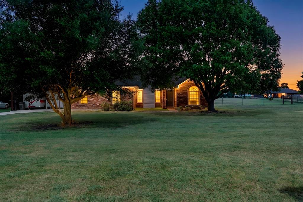Country Living on 2.2 Acres in Waxahachie – NO CITY TAXES!
Discover the possibilities with this 1,692 sq. ft., 3-bedroom, 2-bath home situated on a spacious 2.2-acre corner lot in Waxahachie. Enjoy the freedom of country living with no city taxes and no known restrictions, while still being conveniently located near shopping, dining, and other town amenities. Minutes from I-35 and downtown Waxahachie or Maypearl.
The home offers some updates and features an original garage conversion that creates a large bonus room, perfect for a family room, game room, home office, or flex space to fit your lifestyle. Step outside to enjoy the covered back porch, ideal for relaxing and taking in the peaceful surroundings. The property also includes a 2-car carport and a detached garage workshop with room for up to 3 additional vehicles, making it perfect for hobbyists, storage, equipment, or a home-based business.
With plenty of open space, mature country charm, and endless potential, this property is ready for your personal touch.