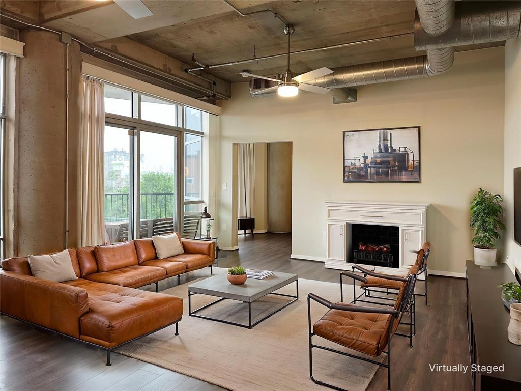 Urban Oasis with Dallas Skyline Views
PRICED TO SELL!  So much to love at this price. Located in the vibrant and rapidly growing Cedars Arts District, this luxury condo offers the perfect blend of style, convenience, and city living. Just minutes from Downtown Dallas, residents enjoy easy access to work, premier shopping, trendy dining, entertainment, and nightlife.
Experience urban living at its finest in this beautifully updated 2-bedroom, 2-bath condo featuring over $30K in modern improvements. Expansive floor-to-ceiling windows showcase stunning Dallas skyline views and are outfitted with electric shades for added comfort and privacy.
Inside, the open-concept layout is highlighted by soaring 10-foot ceilings, exposed pillars, luxury plank vinyl flooring, and a sleek contemporary design. The stylish kitchen features stainless steel appliances, floating shelves, generous storage, and a pantry with stackable washer and dryer.
The spacious primary suite is a true retreat with custom built-ins, exposed brick accent wall, oversized walk-in closet, and spa-inspired bath. The versatile secondary bedroom includes a custom queen Murphy bed, ideal for guests or a home office.
Step outside to your private balcony overlooking the serene community pool. Additional amenities include secure building access, two side-by-side parking spaces, community pool, and nearby dog park access.
Don’t miss this opportunity to own a beautifully updated condo in one of Dallas’ most exciting urban neighborhoods!