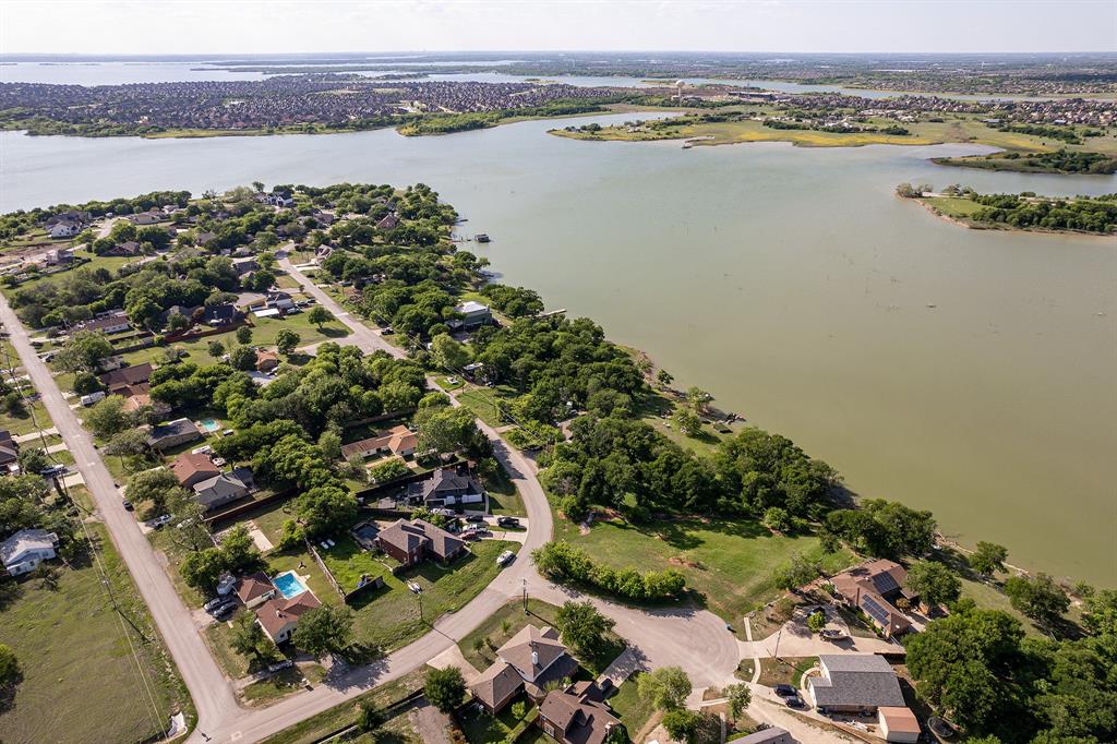 California lakefront living just minutes from the city. Build your dream home on this beautifully treed lot with direct easement access to Lake Lewisville. Enjoy shopping and fine dining at Legacy West and take in the best in entertainment 10 minutes away at Frisco's Universal Park & Resort.  Building plans are available upon request. The adjacent lot on Willow is available for sale as well...look at MLS#: 20296226
Buyer and buyer agent to verify lot measurements and schools. Look at the survey in the attached documents.