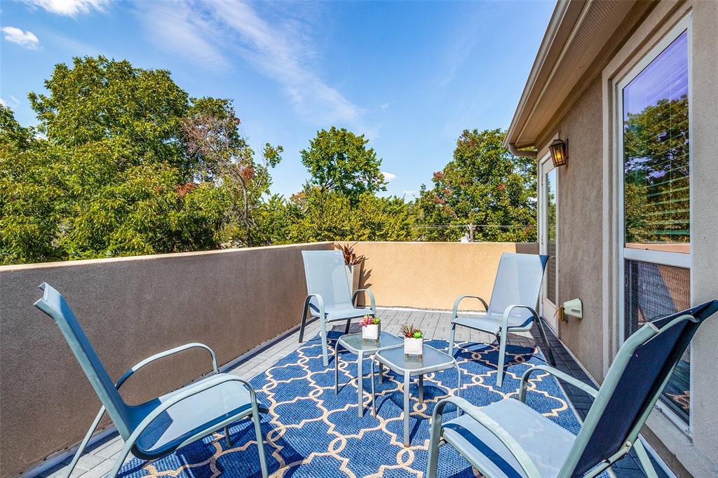 Gorgeous condo with rare second living area. Easy walking distance to Lakewood Shopping Center and Whole Foods! The first floor features a well-lit entry hall, stone flooring, and a nicely proportioned bedroom suite, plus access to the 2-car attached garage. The second floor includes a bright, freshly updated kitchen, a roomy dining area, and a spacious main living area leading to a pleasant walk-out balcony. The primary bedroom suite and another bedroom are located on the third level. A wonderful secondary living area or flex space is situated on the top floor, perfect for home office, kids' playroom, or hobby space, leading out to another generously sized balcony, great for entertaining. Generous closet and storage space throughout! Please note - some photos are from prior occupancy.