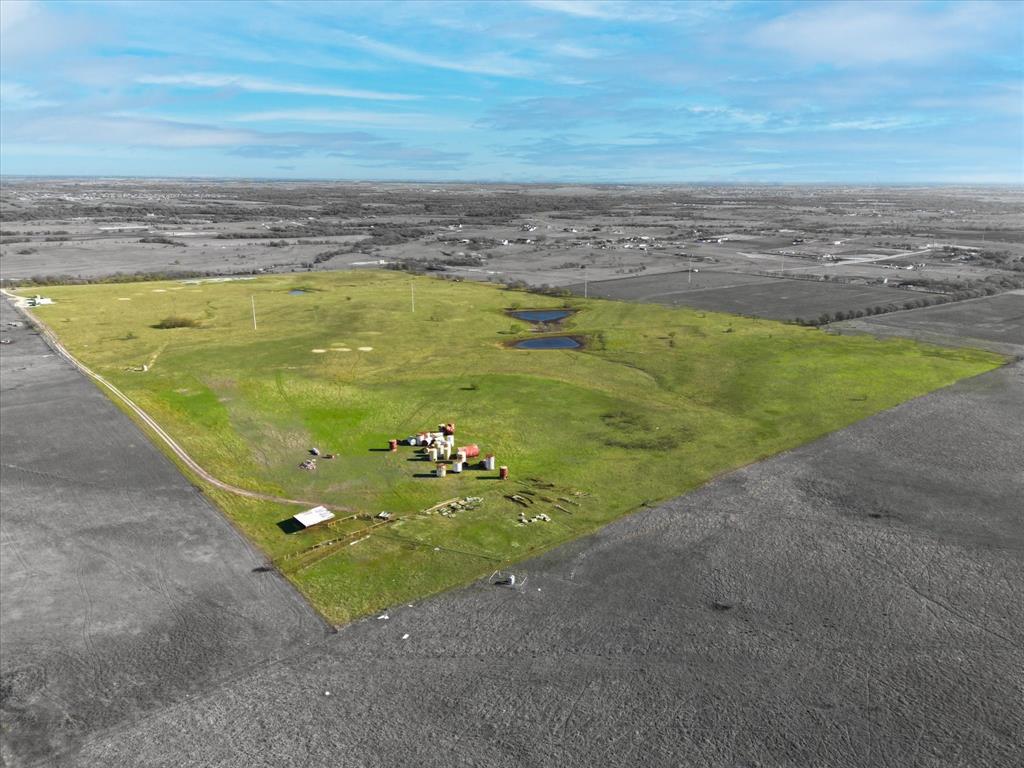 114.6 acres. This beautiful property in a great location has rolling terrain and 3 ponds. AG EXEMPT and used for cattle now. A deep water well. Ready for residential or ranch. Don't miss this extraordinary opportunity.