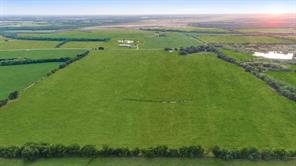 60+- acres farm land, Wheat Crops have been harvested for this year. Bring your Dreams to the Country and own this 60 acres.  County Road is very secluded with only 2 neighbors .  Farm land beside, behind and in front of you for peaceful nights and beautiful scenery . Pasture with some trees. Property in AG.
Water and Electric at the county road .