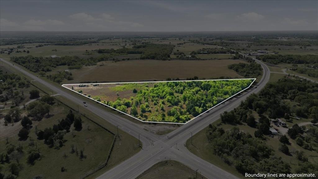 Positioned at the southeast corner of FM 933 and FM 2114, this 8.67-acre tract delivers a standout commercial opportunity in one of the most visible and accessible locations in the area. The corner frontage provides strong exposure from both roadways, creating an ideal setting for a wide range of commercial uses. With ample space and a layout suited for development, the property is well-suited for ventures such as a storage facility, gas station, retail operation, or other commercial concepts that benefit from steady traffic and high visibility.

The land is restricted against RV parks, tiny homes, and mobile homes, preserving the commercial character of the site and supporting long-term value. Its strategic placement offers quick access to Waco, West, Lake Aquilla, and Lake Whitney, and it also sits a short drive from the new data center, adding even more appeal for future growth and customer flow.

With excellent visibility, easy access, and a location positioned for continued development, this corner lot stands out as a prime site for a successful commercial project.