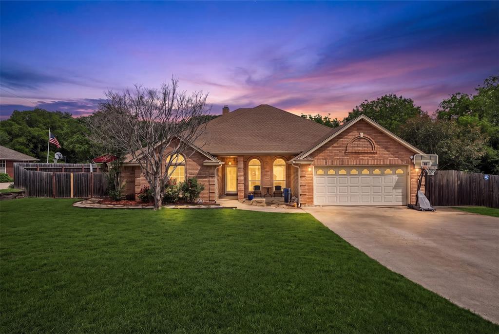 Welcome to 1557 Woodbee Ct in Azle, Texas—a rare opportunity to own a 1+ acre property with its own well, pool, shop, and outdoor kitchen just minutes from Fort Worth. This 3-bedroom, 2-bath home offers over 2,100 square feet of functional living space, combining privacy, versatility, and true Texas lifestyle.

Step inside to an open-concept layout filled with natural light, where the spacious living area flows seamlessly into a large kitchen and dining space ideal for entertaining or everyday living. Clean sightlines and a practical layout make this home feel both comfortable and efficient.

The split-bedroom floor plan provides privacy, with a generously sized primary suite tucked away from the secondary bedrooms, perfect for relaxation. Additional bedrooms offer flexibility for guests, a home office, or hobbies.

Now here’s where this property separates itself:
In-ground pool with rock water features
Fully built-out outdoor kitchen that's perfect for hosting year-round
Detached shop for workspace, storage, or business use
Expansive 1+ acre lot with mature trees
Fire pit + multiple entertaining areas
Room for RV and boat parking

This is not just a backyard, it’s a fully functional outdoor living setup. Whether you're hosting, working on projects, or just want space to breathe, this property delivers.

Located in Azle (76020) with quick access to Highway 199, you get quiet, private living without sacrificing proximity to Fort Worth.