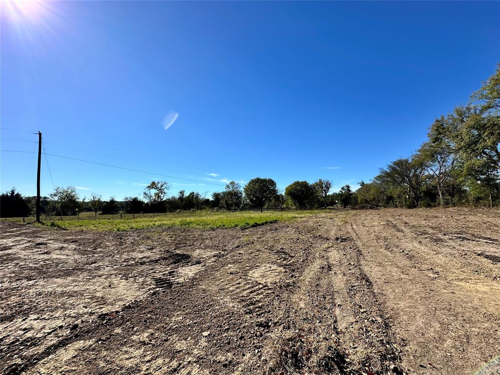 UNRESTRICTED Gorgeous 1.62 acres with pond & Oak Trees just waiting for you!! To be subdivided from larger tract next door.