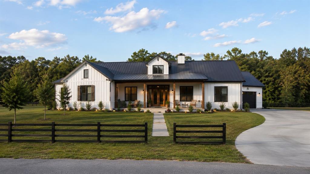Bring your builder and claim 1.1 acres of country living, minutes from downtown Bonham and scenic Lake Bonham. The home pictured is a conceptual rendering shown to illustrate what's possible — not included in the lot price. Set in the established Lakeview #5 subdivision with City of Bonham water and Fannin County Co-Op electric already available, this homesite gives you room for a shop and garden. Zoned to Bonham ISD — Evans Elementary, Rather Junior High, and Bonham High School. An affordable path to acreage and lake access as growth keeps pushing north.