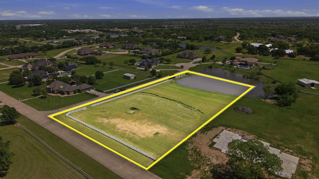 2.75-acre corner estate lot in the heart of Bartonville, located at Show Master Ct & Fox Run in the established Saddlebrook Estates community. This is one of the last remaining opportunities to build in a fully developed, high-end neighborhood where surrounding homes are already complete—no guessing what’s coming next.

The land offers a level, build-ready topography ideal for a custom estate, with existing horse fencing in place for equestrian use. A privately shared pond adds a peaceful water feature and enhances the overall setting.

Positioned for both privacy and convenience, you’re just minutes from Argyle, Flower Mound, and Highland Village, with quick access to major corridors like FM 407 and Interstate 35W. That means an easy commute to Denton, Fort Worth, or even Dallas, while still enjoying the space, quiet, and prestige Bartonville is known for.

This is the final lot of its kind in Saddlebrook Estates. A rare combination: acreage, location, and a finished luxury community. Bring your plans and your offer.