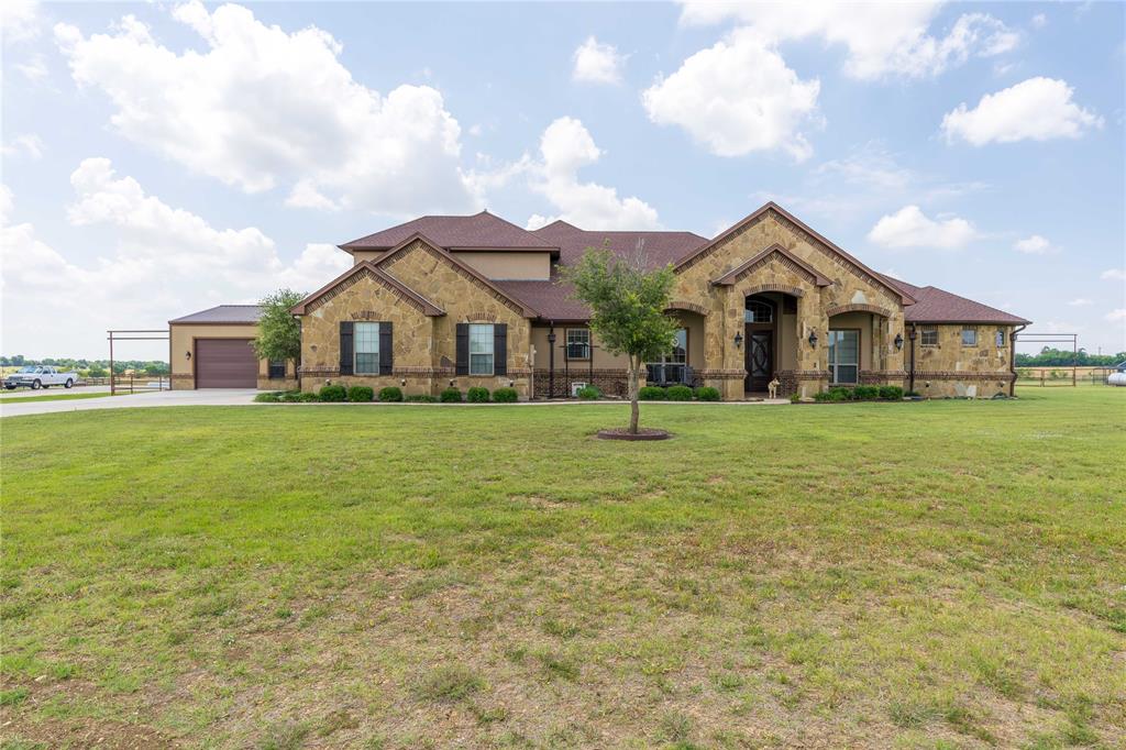 Luxurious, custom 5 bedroom home, 3 car garage with additional 30x40 shop on 2.14 acres in Highmeadow Estates. Picturesque views of the sunsets on this ranchette. Bring your horses! Home was the model with unique barrel ceiling entry, every ceiling has a different design and dazzling, stone surfaces in kitchen and bathrooms. Massive master bathroom with curved, double shower and separate jacuzzi tub. Separate vanities and his and her walk-in closets. Custom cabinets throughout the home, built-in refrigerator and high-end appliances. Upstairs has a spacious media room with full bath. Large covered patio with stamped concrete.