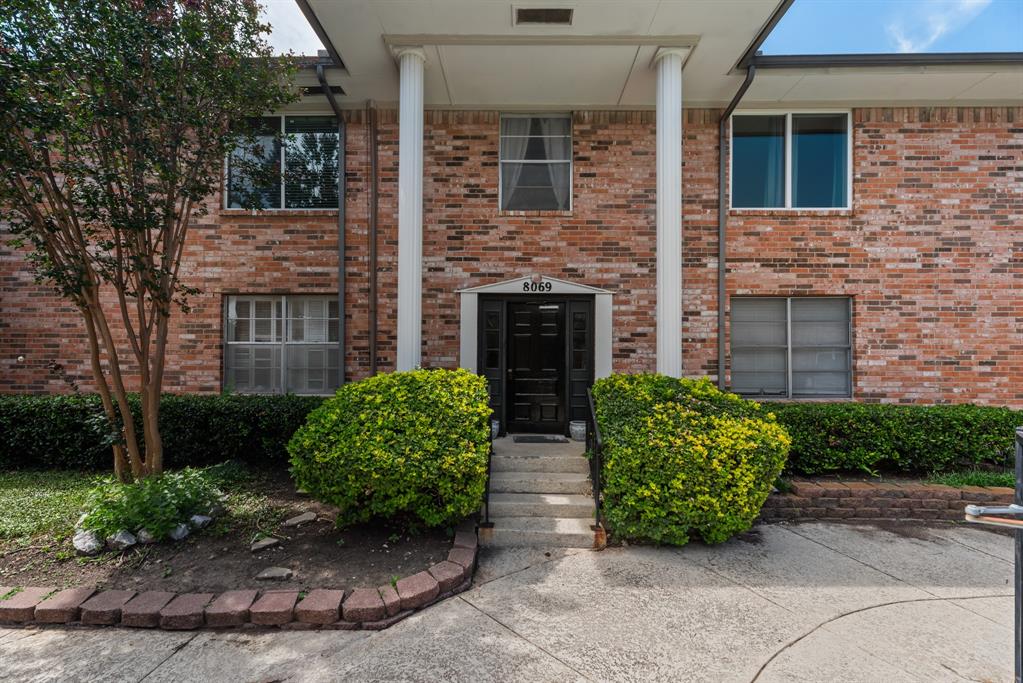 Welcome to this inviting condo nestled in the heart of Dallas! Offering 2 spacious bedrooms, each with walk-in closets and private ensuite bathrooms, this home combines comfort and convenience in an ideal location. The kitchen features quartz countertops, modern appliances, and plenty of cabinet space, flowing effortlessly into the living area complete with a cozy wood-burning fireplace. An additional flex space, formerly a wet bar, has been thoughtfully converted into a dedicated work area—perfect for working from home or tackling everyday tasks. Enjoy your morning coffee or unwind in the evenings on the private outdoor balcony, while large living room windows provide peaceful views of the community pool. Surrounded by mature trees and sidewalks, residents also enjoy access to the community pool and covered parking with direct access to the unit. Conveniently located near major highways, shopping, dining, and entertainment, this condo offers the perfect blend of style, functionality, and location.