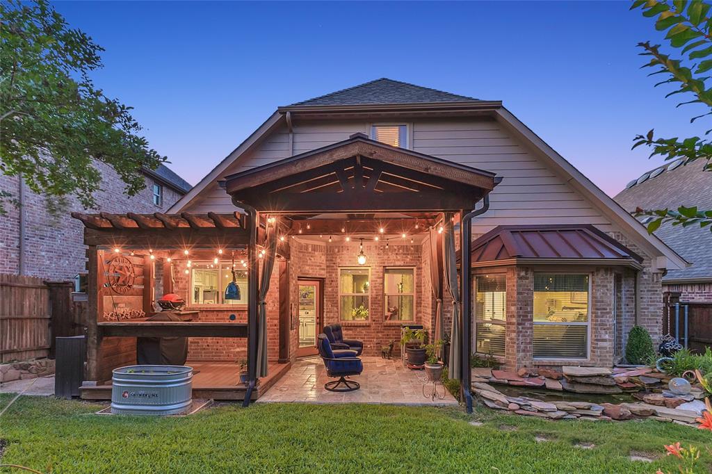 Bring your best offer to 4512 Seventeen Lakes Ct in Roanoke Tx. It is ready for its second owner. $5k credit towards buyer incentives.  The home lives large with an open-concept main living area connected to the designer kitchen, a secondary living or game room that offers flexible space for media or play, the 4th bedroom is a dedicated front-of-house study that is ideal for working from home, homework, or a quiet retreat.  The kitchen was renovated in 2019 and features high-end, soft-close, dovetail-constructed custom cabinets that blend style and durability, creating a polished, upscale feel at the heart of the home.  The primary bathroom has been renovated within the last two years, adding a fresh, modern touch to the private owner’s suite and enhancing everyday comfort.  Additional thoughtful upgrades include an emergency water shutoff manifold in the garage that allows you to shut off water to specific rooms or locations, an automatic sprinkler system for easy lawn care, radiant barrier decking and ridge vents for improved heating and cooling efficiency, and 7.2 surround-sound wiring in the family room for an immersive media experience.  Outside, the home truly shines with a luxuriously updated and meticulously landscaped backyard, where layered flower beds, thoughtfully placed shrubs, and mature plantings frame multiple seating areas to create a private, resort-style retreat.  A tranquil koi pond serves as the focal point of the outdoor space, adding soothing water sounds and visual interest, and pairing beautifully with the hardscape to make the yard feel like an outdoor living room that is perfect for entertaining, relaxing, or enjoying quiet evenings at home.  Located in Seventeen Lakes, residents enjoy access to community lakes, walking trails, and green spaces, along with convenient routes to nearby employment hubs and amenities, making this home a compelling option for buyers seeking both comfort and lifestyle in Roanoke.
