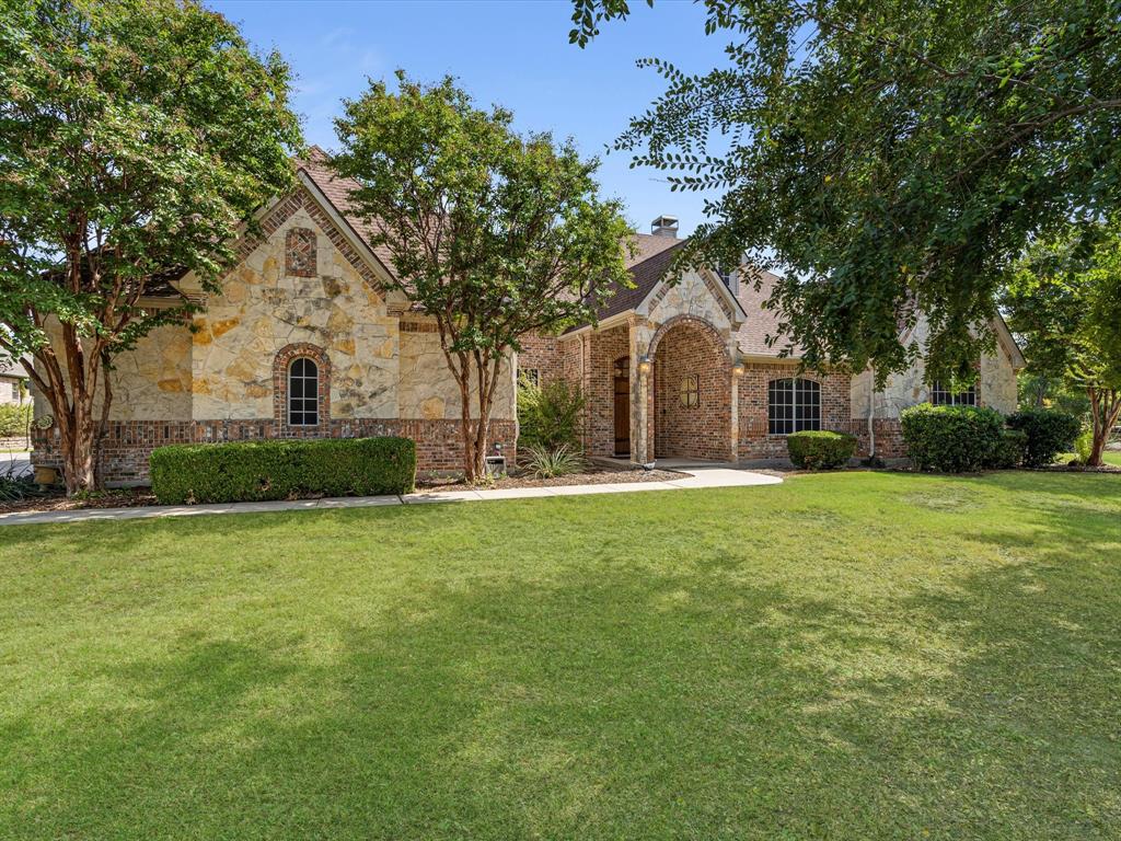 Nestled on a sprawling 1.5+ acre lot, this extraordinary custom home presents a unique blend of luxury, functionality, and natural beauty. Inside, you'll discover a versatile study that could easily serve as an optional fourth bedroom, showcasing the flexibility of this home to suit your needs, but it's not just the main residence that sets this property apart. The chefs kitchen includes double ovens, gas cooktop, SS appliances, and features a butler's pantry. Large picture windows in the rear living area invite the outdoors in, providing an uninterrupted view of your private backyard oasis. A serene pond, offering tranquility. The seller has thoughtfully finished out the barn, transforming it into a charming art studio. There's even a convenient chicken coop right outside the barn! This outdoor haven extends to a well-maintained pool with built-in stone cocktail table with seating area. There's also an outdoor kitchen area, ideal for hosting memorable gatherings and al fresco dining.