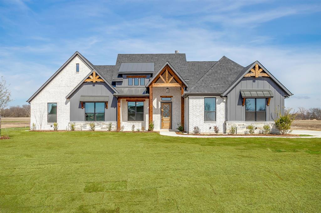 20K YOUR WAY INCENTIVE! Stunning New Construction on 1 Acre — The Blaire Floor Plan in Waxahachie ISD. Welcome to the beautifully designed Blaire floor plan, offering 2,705 square feet of thoughtfully crafted living space on a full 1-acre lot. This 4-bedroom, 3-bath home with a spacious game room blends luxury, comfort, and functionality — perfect for modern living and entertaining. Step inside to soaring tray ceilings in the family room, primary suite, and game room, adding architectural interest and an airy, upscale feel throughout. The gourmet kitchen is the heart of the home, featuring premium finishes and a propane package ideal for elevated cooking and efficiency. The private primary suite offers a relaxing retreat, while three additional bedrooms provide flexibility for guests, home office, or hobbies. Enjoy the space and freedom that come with a full acre — perfect for outdoor living, future additions, or simply soaking in the wide-open Texas skies. Estimated completion: February 1st. Don’t miss this opportunity to own a brand-new home with acreage, style, and top-tier design — schedule your showing today!