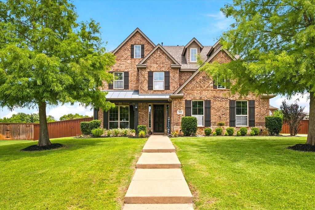 Nestled in a desirable neighborhood that offers a peaceful retreat from the hustle and bustle, this stunning home combines comfort, space, and convenience. Located just minutes from the Sunnyvale ISD campus, shopping, dining, and easy access to I 30 and US 80, you'll enjoy the perfect balance of privacy and accessibility.

The open-concept floor plan is ideal for entertaining and everyday living, featuring spacious living areas designed for gathering with family and friends. The primary suite is conveniently located on the first floor and boasts a generously sized bedroom, a double-sided fireplace, and an adjoining sitting room or private office creating a true owner's retreat.

Upstairs, you'll find the secondary bedrooms along with two full bathrooms, including a Jack and Jill bath. A dedicated media room and large bonus room provide endless possibilities for entertainment, recreation, or additional living space.

Step outside to enjoy the covered patio overlooking the expansive backyard, perfect for outdoor gatherings, play, or relaxation. Residents also enjoy access to HOA amenities, including community pools, a park, and a fishing lake all within walking distance.

The three car garage offers plenty of room for vehicles, storage, or recreational equipment.

This exceptional home has it all and won't last long. Schedule your private showing today!