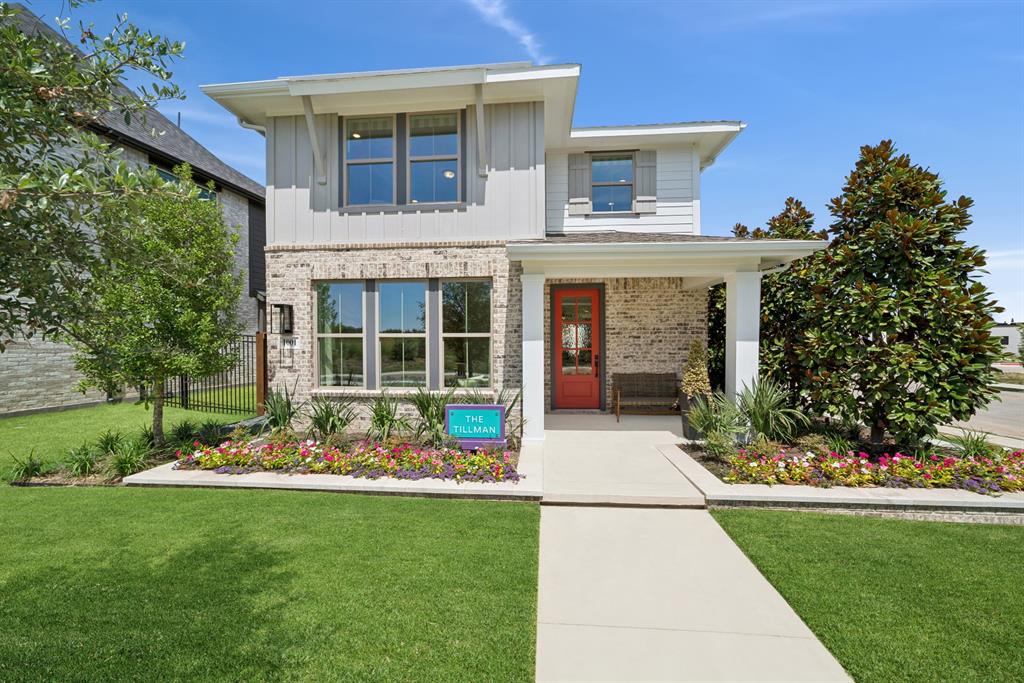 Experience a model home that perfectly balances modern design with everyday comfort. With its welcoming front porch and charming exterior, this home invites you in from the very first glance.

Inside, you’ll find a light-filled, open layout where expansive windows stretch across the main living spaces, creating an airy, connected feel. The kitchen stands out with rich black cabinetry, striking gold and black fixtures, and a large island that serves as both a functional workspace and a natural gathering spot.

The Owner’s Retreat offers a quiet escape, complete with a spa-like bath and a beautifully designed super shower. Upstairs, a spacious gameroom provides incredible flexibility whether you envision a media space, playroom, or second living area. The secondary bedrooms are generously sized and full of character, offering comfortable, inviting spaces for family or guests.

Throughout the home, warm wood tones, soft neutrals, and bold accents come together to create a look that feels both fresh and timeless. Designed with both style and livability in mind, this home offers the perfect setting for relaxing, entertaining, and making lasting memories.