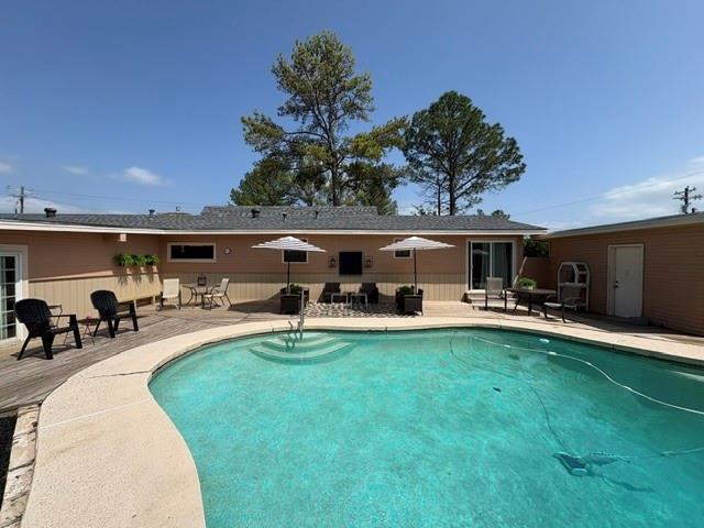 Beautifully remodeled 4 bedroom home conveniently located on 2353 at Possum Kingdom Lake offering the perfect blend of comfort, charm, and outdoor living. Surrounded by large mature trees, this property provides shade, privacy, and a peaceful setting while still being close to everything the lake area has to offer.

Inside, the home has recently undergone tasteful renovations creating a fresh and inviting atmosphere with updated finishes and spacious living areas designed for both everyday living and entertaining. The functional floorplan offers plenty of room for family and guests with four comfortable bedrooms and welcoming common spaces.

Step outside to enjoy a fantastic outdoor entertaining area featuring a sparkling inground pool perfect for relaxing on warm Texas days or hosting gatherings with friends and family. The backyard setting creates your own private retreat with plenty of space to enjoy the outdoors beneath the beautiful mature trees.

Adding even more value and versatility is the impressive 30x50 shop offering ample space for boat storage, hobbies, equipment, vehicles, or a workshop. Whether you need extra storage or a place to work and play, this shop provides endless possibilities.

Whether you are looking for a full time residence, weekend getaway, or investment opportunity near Possum Kingdom Lake, this property offers location, comfort, and outdoor enjoyment all in one package. Don’t miss the opportunity to own this move in ready home in a highly desirable area.