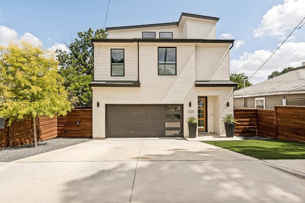Experience modern city living just minutes from the heart of Dallas in this striking contemporary residence designed for both comfort and impact.
From the moment you enter, you’re welcomed by a bright, open-concept layout that connects the main living, dining, and kitchen areas seamlessly perfect for entertaining or everyday living. Expansive windows throughout the main level fill the home with natural light and create an airy, inviting atmosphere.
The second-floor primary suite offers a private retreat with a spa-inspired bath featuring a soaking tub, dual vanities, a walk-in shower, and a spacious walk-in closet.
The true centerpiece of this home is the third-floor rooftop level, showcasing absolutely amazing, jaw-dropping views of the Dallas skyline. The views are so exceptional that the current owners chose to convert the original game room into the primary bedroom to fully take advantage of the scenery every day. This flexible space can easily be reverted back to a game room or second living area if desired. It also includes a half bath and direct access to a private rooftop terrace ideal for entertaining or enjoying the city lights at night.
Perfectly positioned in a rapidly growing area, the home offers exceptional access to some of Dallas’ most popular destinations. You are just minutes from the Dallas Zoo, a short ride to the vibrant Bishop Arts District, and adjacent to Tama Park. With quick connectivity to major highways, Downtown Dallas, and Dallas Fort Worth International Airport, commuting and travel are effortless.
This home delivers the rare combination of dramatic skyline views, flexible living space, and unbeatable urban convenience—all in one standout property