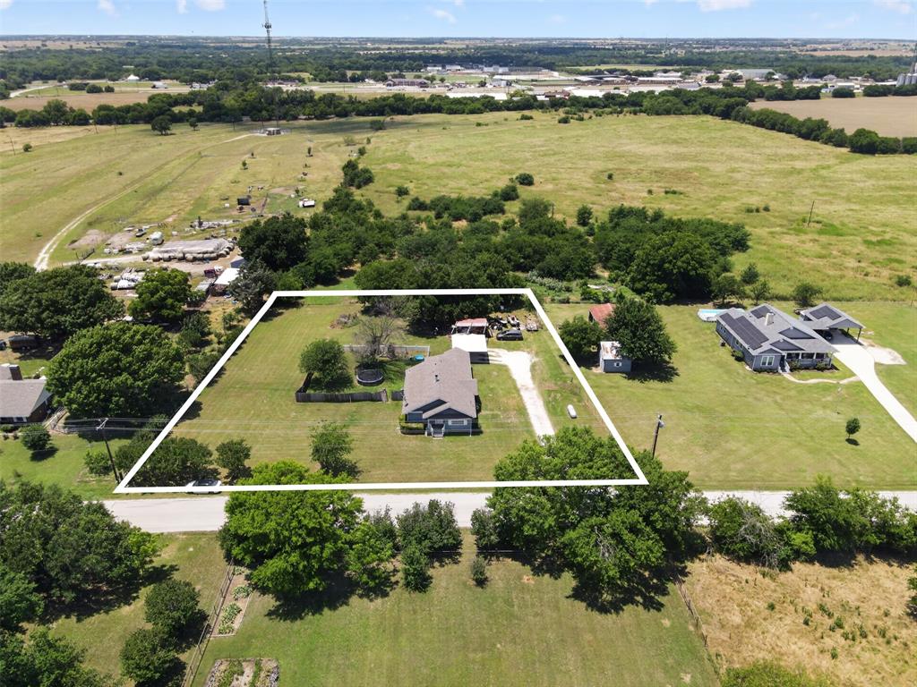 500 S Pecan Creek Trail – Valley View, TX – 1940's Bungalow on 1.116 acres in Valley View, TX. 

This 1.116-acre home has THREE bedrooms and TWO full bathrooms, one original bathroom with a claw-foot tub and a modern full bath ensuite off the master bedroom. Storage is abundant throughout, and the property includes a storm cellar, covered parking and the storage container remains. NEW ROOF, exterior paint, and a new fence. The property has two covered carport spaces, a covered front porch, patio, and rear porch. Convenient to I35. Make this country charmer your very own.