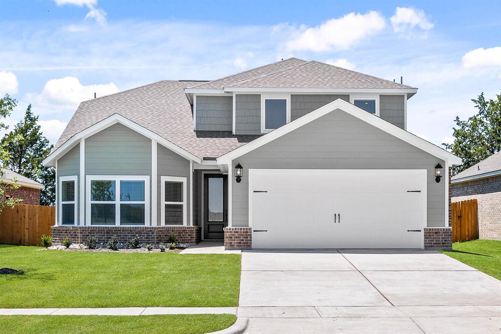 Welcome home to this spacious, modern retreat designed for effortless living and everyday comfort. Enjoy open-concept living spaces, a convenient half-bath, and a sprawling master suite that serves as your personal escape. The kitchen features state-of-the-art Whirlpool® appliances, sleek finishes, and a walk-in pantry—perfect for both weeknight dinners and weekend entertaining. The open flow between the kitchen, dining, and living areas makes hosting family and friends a breeze. The master suite offers a peaceful retreat with abundant natural light, a large walk-in closet, and plenty of space to unwind. Upstairs, you’ll find three additional bedrooms and a full bath, providing comfort and privacy for everyone. With no rear neighbors and a lush green backdrop, you’ll enjoy privacy and serenity right at home. Every detail is enhanced with the CompleteHome Plus™ package, combining designer upgrades and modern conveniences for a truly elevated living experience.