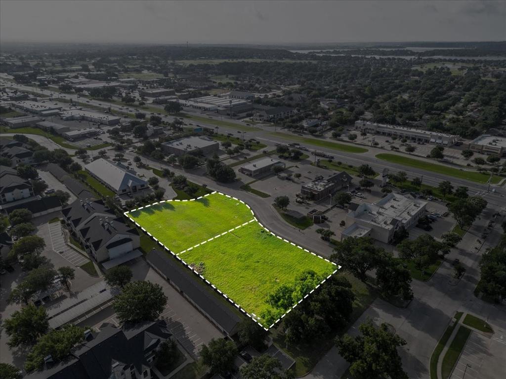 Prime Commercial Corner – 1.106 Acres

Rare commercial development opportunity located at the signalized corner of Hill Blvd. and Crawford Ave. in Granbury, Texas. This 1.106-acre corner tract offers exceptional visibility, accessibility, and exposure in one of Granbury's growing commercial corridors.

Surrounded by established residential neighborhoods, medical offices, retail centers, restaurants, and service businesses, the property is ideally positioned to serve a strong and expanding customer base. The site's strategic location provides convenient access to major thoroughfares and benefits from consistent local traffic.

Ideal for retail, restaurant, medical, professional office, convenience, or service-oriented development. With strong area demographics and continued growth throughout Granbury, this property presents an outstanding opportunity for investors, developers, and owner-users seeking a premier commercial location.

Highlights:

1.106 Acres
Prime Corner Location
Excellent Visibility & Access
Surrounded by Residential, Retail, Medical & Restaurant Uses
High-Growth Trade Area
Ideal for Retail, Medical, Office, or Restaurant Development