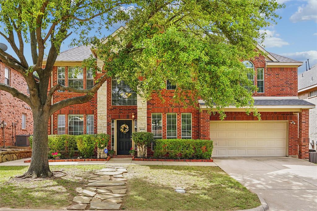 RECEIVE Up to $5000 SELLER CREDIT!!  NEW ROOF 2026! Seller Pays title ! Home qualifies for a preferred lender 1% rate buy-down. Exquisite 5-bedroom, 3-bath home offering perfect blend of convenience & charming hometown feel. Impressive open-concept design featuring cathedral ceilings and abundant natural light. The spacious den is the heart, highlighted by a beautiful marble fireplace.  A large formal living room & dining area provide perfect setting for entertaining or flex into home office or living space. The updated kitchen is designed for both everyday living & entertaining, offering generous counter space, abundant cabinetry, a center island ideal for meal prep or casual dining & an additional kitchen dining area perfect for family meals.  Versatile downstairs bedroom is generously sized to accommodate a king-size bed & sitting area, making it an ideal setup for an in-law suite, guest retreat, or multigenerational living. The primary suite provides a relaxing escape, featuring a luxurious en suite bath with a garden jetted tub, double vanities, a separate shower, and a spacious walk-in closet. Upstairs, four additional bedrooms & a large game room create endless possibilities for family living, media space, or play areas offering flexibility to meet a variety of lifestyle needs. Outdoor living is equally impressive a large pergola-covered patio, perfect for grilling, relaxing, & entertaining. The beautifully landscaped front and back yards showcase flowering trees and thoughtful greenery, adding to the home's curb appeal and outdoor enjoyment. Located in a rare and highly desirable gated community, this home offers privacy and security while remaining conveniently close to shopping, parks, a golf range, churches, and everyday amenities. A rare opportunity to enjoy spacious living, flexible design, and gated community comfort in one exceptional home.
