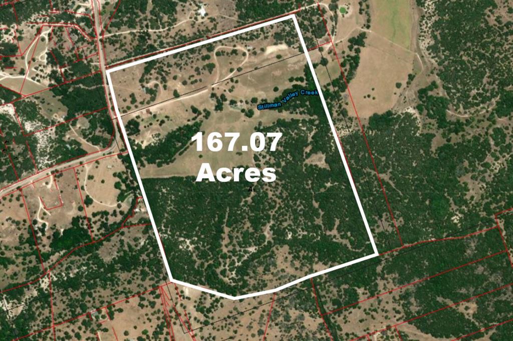This outstanding 167 acres offers a rare opportunity for a homestead, weekend getaway, hunting and recreational ranch, or future development. Ideally situated approximately one hour from downtown Austin, 20 minutes from Salado, and 30 minutes from Georgetown, the property provides both convenience and a peaceful country setting. The land features an excellent blend of dense woods and productive bottomland fields. Tree cover includes oak, elm, pecan, and cedar, with selective cedar clearing already completed to reveal beautiful live oak parks. Rolling topography ranges from 810 to 930 feet in elevation, with the higher points showcasing expansive Hill Country views. Stillman Valley Creek meanders through the ranch and offers potential sites for ponds or a lake. Improvements include a small ranch house and a mobile home. The house is currently leased, and either dwelling would be ideal for a foreman, guests, or continued rental income. Additional improvements consist of a barn and functional working pens. If you're searching for a ranch that’s close to everything, loaded with natural beauty, and positioned for significant upside—yet far enough out to escape the crowds—then Firefly Ranch is well worth a look