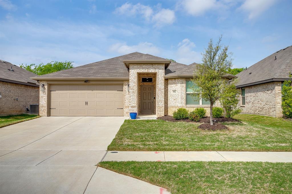 Built in 2022 and meticulously maintained, this 3 bedroom, 2 bath home offers 1,621 square feet of modern comfort in pristine condition. From the moment you arrive, the clean curb appeal and well kept landscaping set the tone for what is inside.

Step into a bright and welcoming entry that leads to an open concept living, dining, and kitchen space designed for both everyday living and entertaining. The kitchen features granite countertops, stainless steel appliances, ample cabinetry, and a large island with seating, all overlooking a spacious living area filled with natural light. The split bedroom layout provides privacy, with a comfortable primary suite and well appointed secondary bedrooms.

The interior shows like new with neutral tones, durable flooring, and thoughtful finishes throughout. Outside, enjoy a fully fenced backyard with plenty of room to relax, play, or entertain under the covered patio.

Conveniently located with quick access to Chisholm Trail Parkway, this home offers an easy commute and close proximity to shopping, dining, and everything Fort Worth has to offer. Move in ready and exceptionally cared for, this is one you do not want to miss.