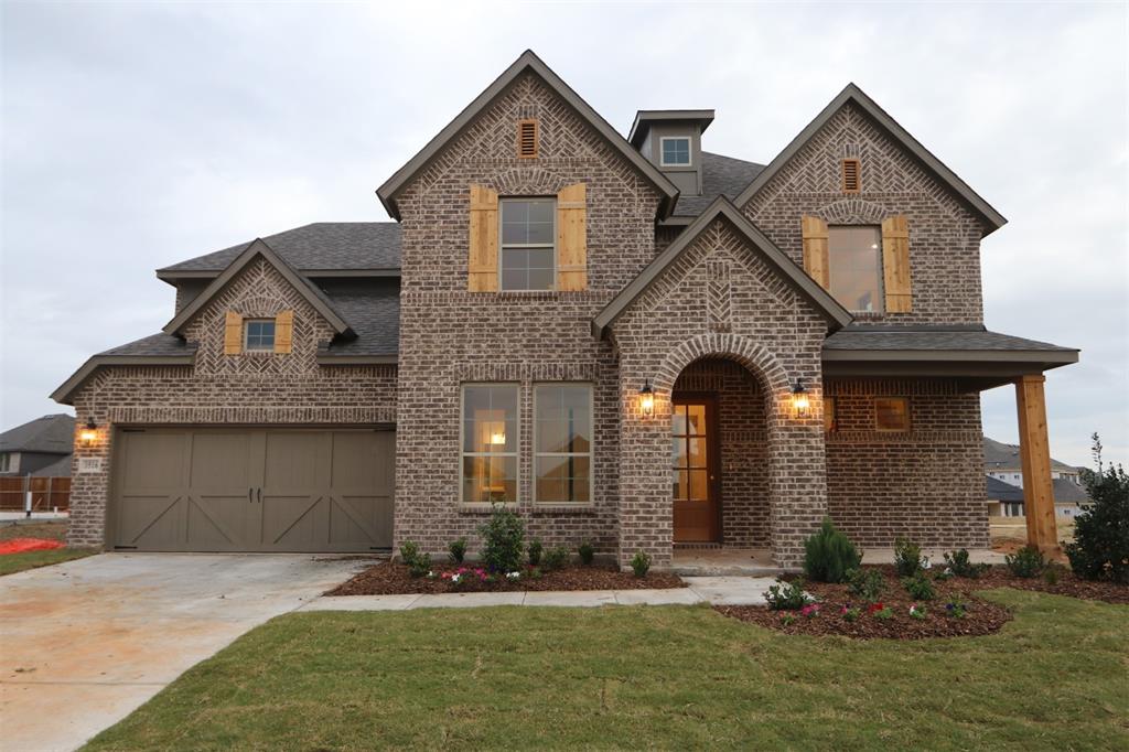 Built by M-I Homes. This new construction home in the amenity-rich community of Lilyana, located within Prosper ISD offers a spacious 2-story layout with tall ceilings, wood flooring in the main living spaces, a gourmet kitchen, an extended covered patio, a luxurious owner's suite, an upstairs media room, and so much more! A few of the grand, baluster lined staircase greets you in the foyer. A private home office is secluded by French doors and across the hall, you'll find a bedroom, a full bathroom, and built in cabinets conveniently located near access to the 2-car garage. 2-story ceilings and large windows in the family room enhance the space and an extra boxed out window in the dining nook further illuminates the space. The upgraded kitchen includes stainless steel appliances, ample cabinetry, marble-inspired countertops, and an island with pendant lighting. The private owner's suite features a bay window plus both a tub and shower in the en-suite bath. Schedule your visit today!