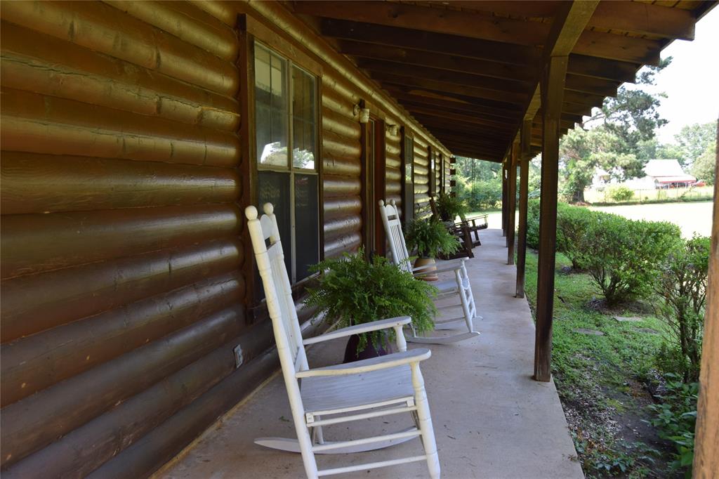 A rare opprortunity to own a beautifully well maintained log home that is situated on 3.33 acres+- in Minden located close to Minden Airport and Caney Lake.Offering the private blend of space,privacy,and convenience,this property provides room to spread out while remaining mintues to downtown Minden with shopping,dining,and easy access to Bossier and Ruston.There also Eden Manufacturing,Minden Medical Center,Camp Minden and several other types of employment.From the moment you arrive you will enjoy a peaceful sitting of mature trees and wide-open green space create a welcoming back drop for every day living entertaining and enjoying the outdoors.This property has endless possibilties with a great place for a garden.There is a 60 ft. front porch and also a covered back porch for relaxing after a long day at work.The spacouis layout of the home offers comfortable living with inviting gathering spaces with family and friends!The inside of the home has an open concept with large Den,wood burning firepalce,and valuated celings open to kitchen and extra large breakfast area.There is lots of cabinet and counter space that would be great for family gathering. There three bedrooms and two baths are on the same side of the home.They are all a nice size.Thre is 30x24 shed with two stahls.The air plat is not correct! It does include the shed at the back of the property.Call today to view this move in ready home!