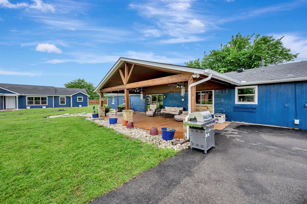 Discover a rare opportunity offering flexibility, INCOME potential, and room to grow in a desirable Keller location. Situated in an unincorporated area, with TWO residences, this property allows for commercial use, up to five outbuildings, and the benefit of lower taxes, making it ideal for business owners, multi generational living, or those seeking space without restrictions. Inside the main house, the thoughtfully designed kitchen is a chef’s dream with granite countertops, a gas cooktop with vent exhaust, double ovens, a wine rack, and a spacious butler’s pantry large enough to accommodate a second refrigerator. The kitchen opens seamlessly to a stunning floor to ceiling brick, wood burning fireplace that anchors the living area with warmth and character. The flexible floorplan includes a large flex space ideal for a home office, workspace, or additional living area. The primary suite is designed for comfort and function, featuring separate his and hers closets, a Hollywood bath with dual vanities, and a walk in shower. Outdoors, the property continues to impress with a 40'x50' barn with 3 stalls for horses, 8in concrete floors and peaks at 15' and a stable that includes a built in workshop, offering endless possibilities for hobbies, storage, or business use. One of the standout features is the second home finished in 2022, a well appointed 3 bedroom, 2 bathroom residence and approximately 1,500 square feet, complete with a large covered patio, making it perfect for guests, rental income, or a private office setup. The main home also offers a detached 2 car garage and its own expansive covered patio, creating multiple spaces to relax and entertain. *Owner financing is available* With room to expand, work, and live the lifestyle you want, this one of a kind property delivers versatility that is hard to find and is ready for its next owner now. Call today for more information!