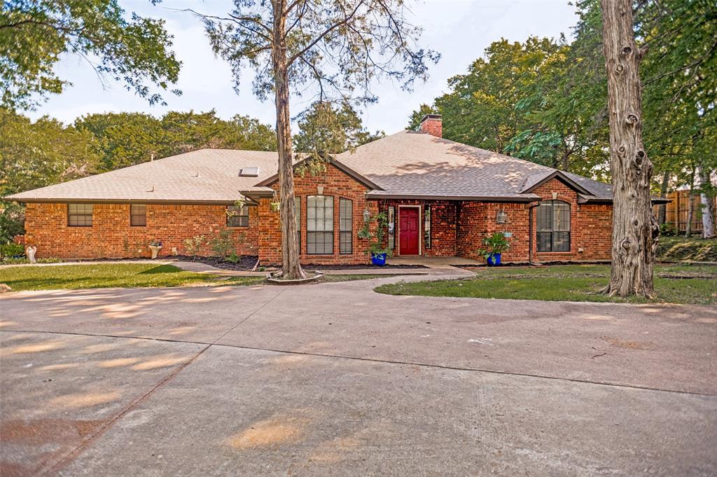 Nearly five acres inside Dallas city limits. Let that sink in.

While the rest of the metroplex competes over quarter-acre lots, this property quietly sits behind an electric gate and circular drive, surrounded by mature trees that have been doing their job for decades — blocking the Texas sun, muffling the city noise, and making an afternoon on the property feel like a retreat you didn't have to leave town to find.

The home itself delivers where it counts. At 2,794 square feet with 3 bedrooms, it's sized for real life. The kitchen centers around a grand island built for actual use — whether that's Sunday meal prep, a crowd gathering around during the holidays, or just a proper place to start the morning. The primary ensuite is a genuine respite, thoughtfully finished and sized to match the scale of the property. A bonus room tucked on the garage side adds flexibility that growing households, remote workers, and multigenerational living situations all have a way of needing eventually.

Outside, a covered RV carport handles the toys, the trailer, or the weekend rig without asking you to park in the open Texas heat.

The grounds are where the imagination runs. Kids and pets have room to actually roam — not a fenced postage stamp, but genuine open space with canopy shade that makes it usable even in summer. There's ample room to add a pool, an outdoor kitchen, a covered entertaining area, or all three, without crowding the yard. The undeveloped acreage beyond that carries its own weight as well — a subdivision opportunity worth exploring with your attorney and the City of Dallas Planning Department. Inside city limits, raw land of this size doesn't come up for sale often. It gets passed down, land-banked, or quietly developed before it ever hits the MLS. Schedule a tour today!